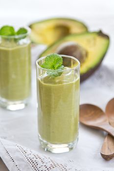 Fresh Avocado smoothie with mint on top