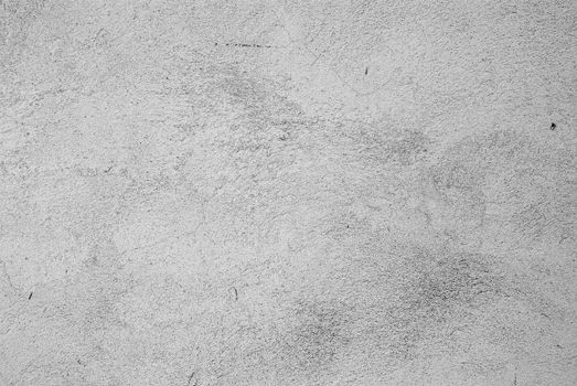  the gray textured wall in grunge style
