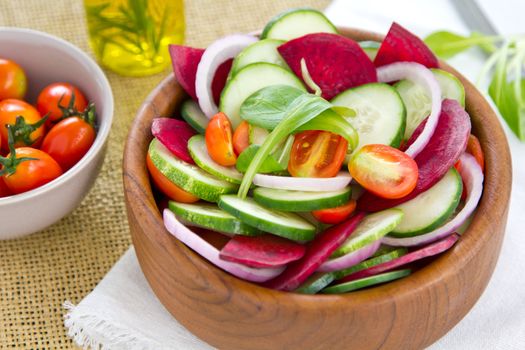 Cucumber and Beetroot with cherry tomato and onion salad