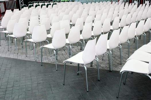 White chairs rows in conference hall