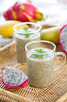 Dragon fruit and Mango smoothie with mint on top