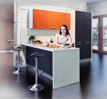 Young beautiful woman in kitchen interior photo