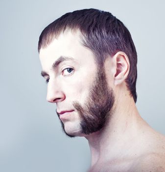 man with sideburns close-up photo