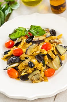 Fettuccine with aubergine, olive and dried chilli