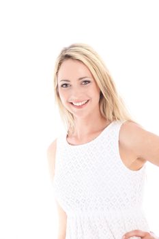 Beautiful cheerful casual woman with a lovely big smaile standing on a white studio background Cheerful casual woman witha lovely big smaile standing on a white studio background 