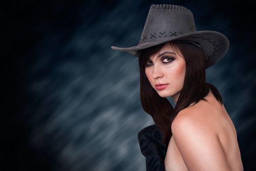 Sexy beautiful and fashionable woman in a hat.
