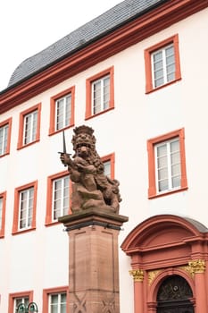 A statueof crowned lion with sword in Heidelberg in Germany
