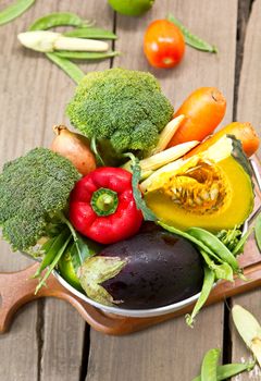 Fresh varieties of Vegetables in colander