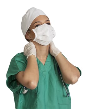 Female doctor massaging her nape with a tired attitude,isolated against a white background.