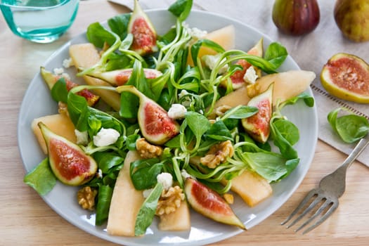 Fig,Cantaloupe with Goat cheese and walnut salad