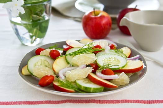 Apple, tomato,cucumber and Grapefruit salad with yogurt dressing