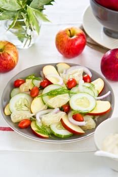 Apple, tomato,cucumber and Grapefruit salad with yogurt dressing