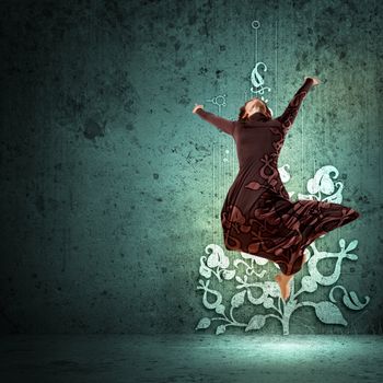 Girl dancing in a color dress with a gray background. Collage