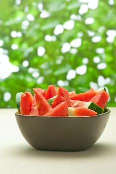 Bowl of cut watermelon slices in nice summer colors