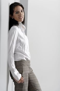 Professional working woman in corporate business trousers and shirt