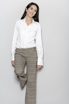 Professional working woman in corporate business trousers and shirt