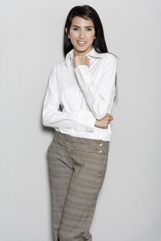 Professional working woman in corporate business trousers and shirt