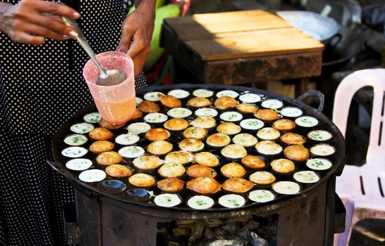 Varieties of Burmese 's dessert sell on a street in a market ,Yangom,Burma