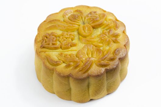 Mooncake cutted with lotus seed paste and yolk inside, isolated white background