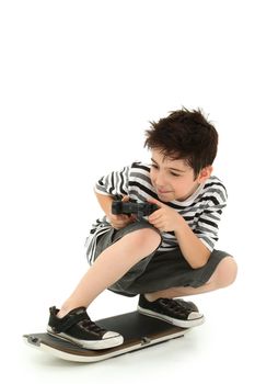 Indoor video game skateboarder gamer with remote control board and joystick over white background.