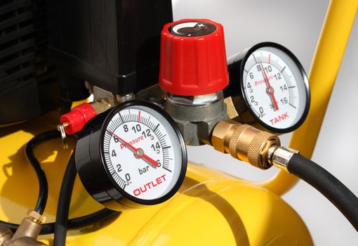 Pressure meters and compresser safety valve closeup