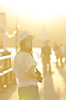 Female photographer in sunshine