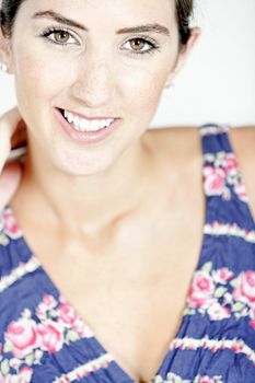 Beautiful young woman wearing a blue summer dress