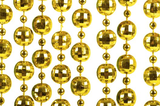 Background made of a brilliant celebratory beads of golden color
