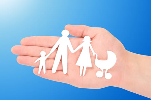 Paper family in hands