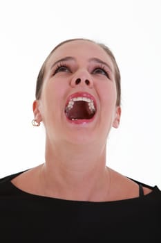 Portrait of afraid screaming young woman