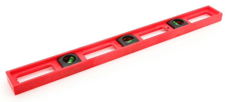 Red and black plastic construction level tool on white background.
