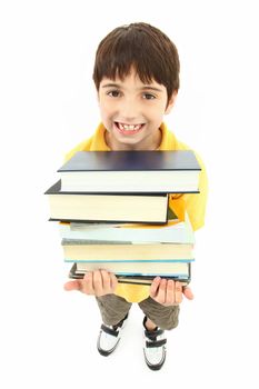 Back to school boy child with stack of text books and big smile.