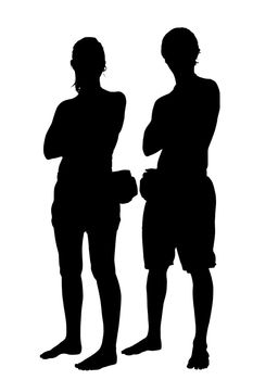 Silhouette of couple in beach clothing and fanny packs.