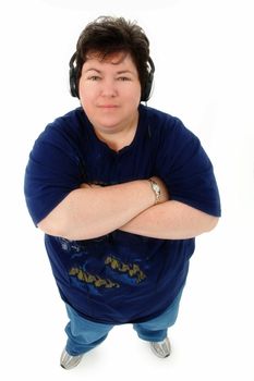 Attractive Confident Obese Forty-Five Year Old Woman with Headphones Standing Over White Background.