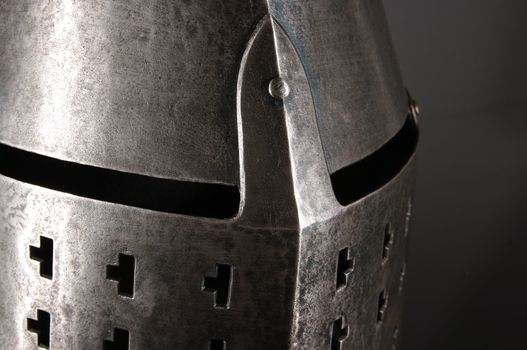 Iron helmet of the medieval knight. Very heavy headdress.