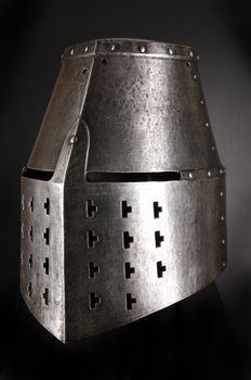 Iron helmet of the medieval knight. Very heavy headdress