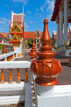 Beautiful Buddhist temple on  background of blue sky, Thailand.