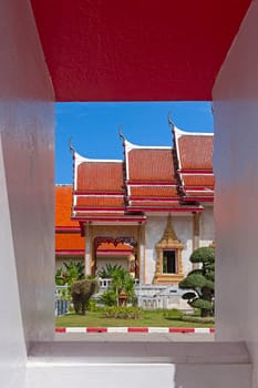 Beautiful Buddhist temple on  background of blue sky, Thailand.