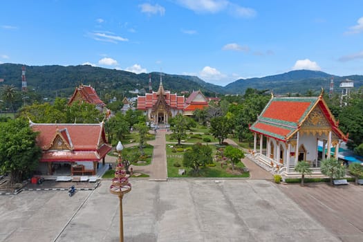 Beautiful Buddhist temple on  background of blue sky, Thailand.View from above.