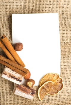 Menu Design.Old paper, coffee bean, cinnamon, lemon, burlap.