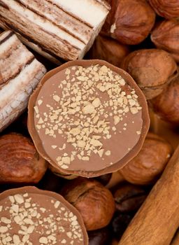 Closeup of coffee beans, cinnamon and nuts