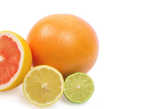 Image of a fresh whole lime, lemon and orange isolated on white