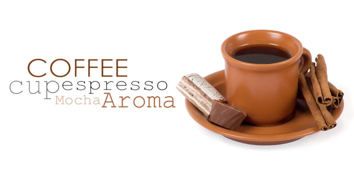 Closeup shot of freshly prepared cup of italian espresso with cinnamon and candy over white background
