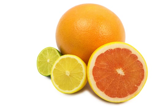 image of a fresh whole lime,lemon and orange isolated on white
