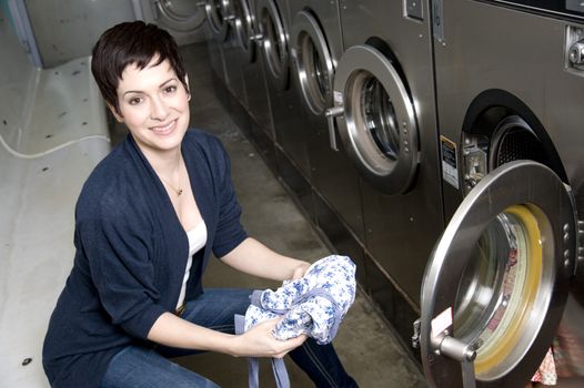 She does laundry with a smile