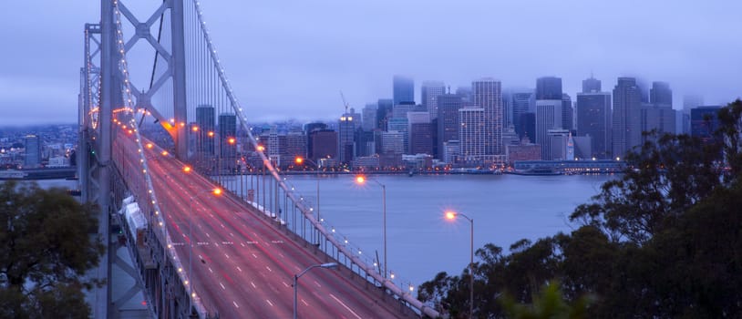 Traffic moves into downtown San Francisco early in the morning