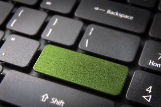 Green key on laptop keyboard with blank space. Included clipping path, so you can easily edit it and include your own color, text or icon.