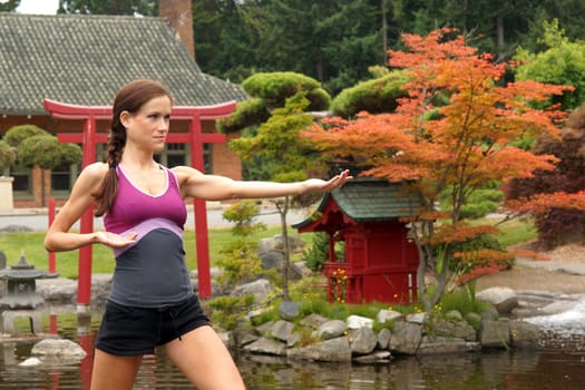 A woman practices Yoga in a beautiful place