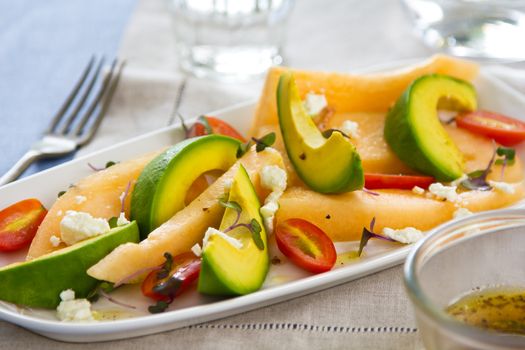 Avocado with Cantaloupe and Feta cheese salad by vinaigrette