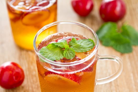 Plum juice with fresh plum and mint